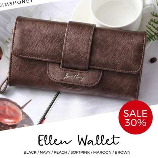 black wallet with a white coffee mug on a white table