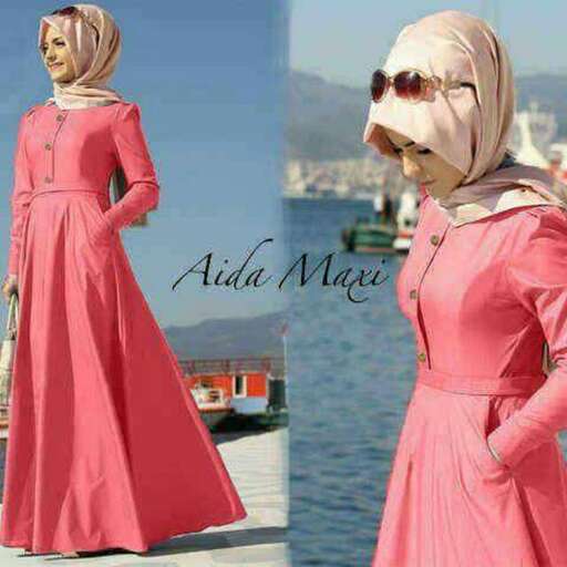 a woman in a pink dress