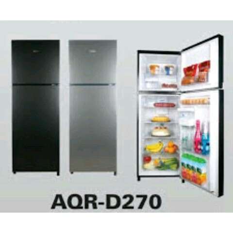 a refrigerator door with a freezer door open.