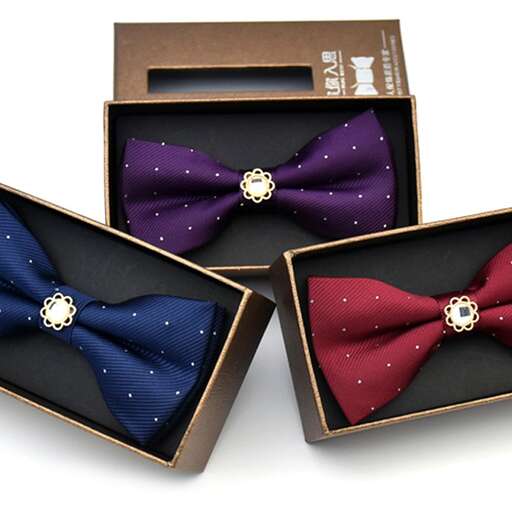 a box with a bow tie in it