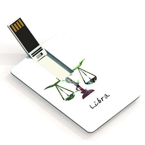 a paper with a pencil and a green plant on it.