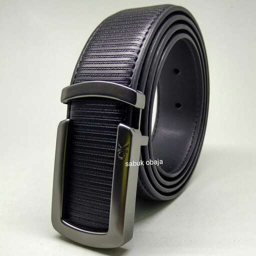 a leather belt with a black leather band