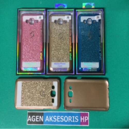 a set of different colored cell phones in a case.