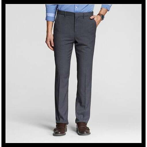 a pair of trousers with a shirt and tie.