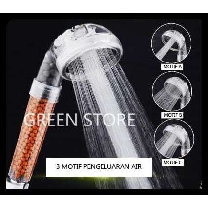 a green shower head with a clear water spout.