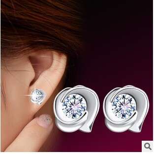 a woman with a ring on her ear.