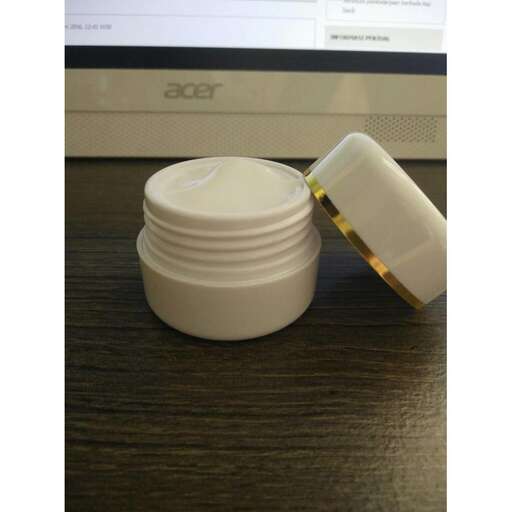 a cup of coffee is placed on a desk.