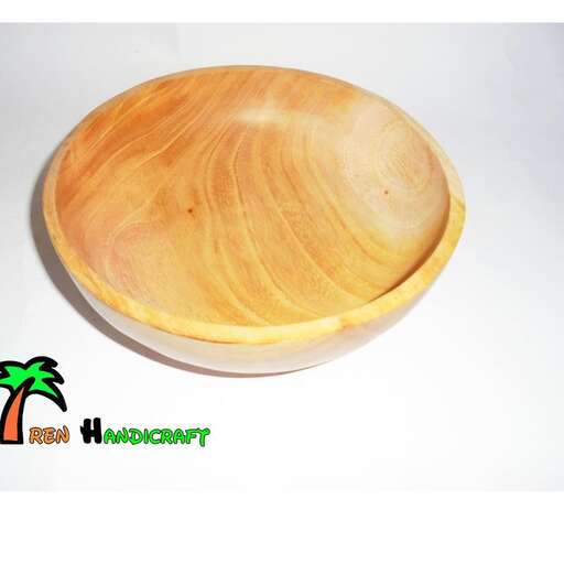 a wooden bowl with a cut out of the top.