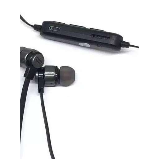 a pair of headphones sitting on top of a white surface.