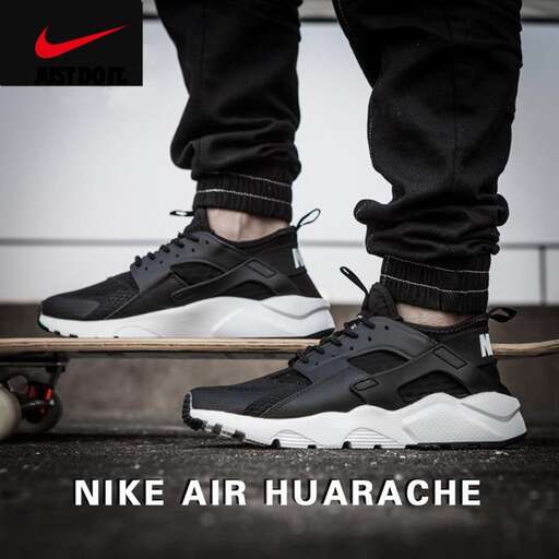 a man standing on a skateboard with a skateboard.