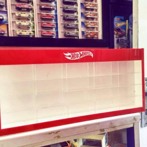 the red and white board in the shop.