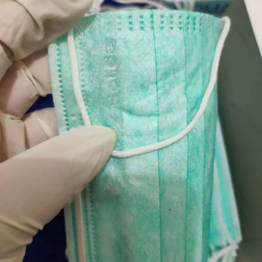 the gloves are made from a piece of fabric.