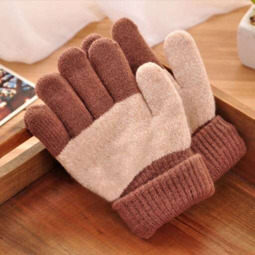 a pair of gloves on a table