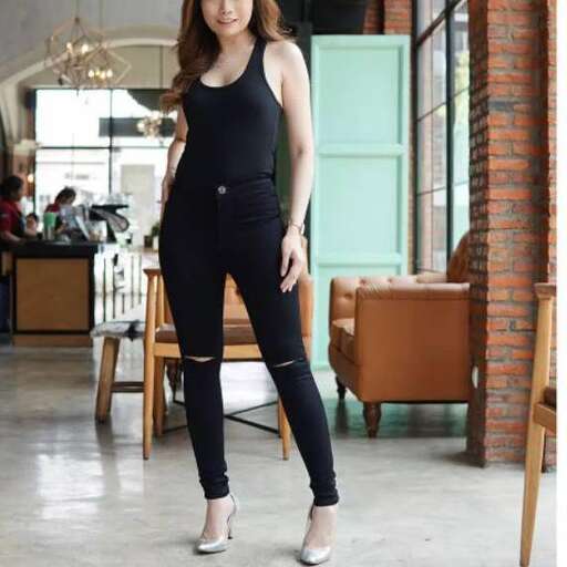 person in a black jumpsuit