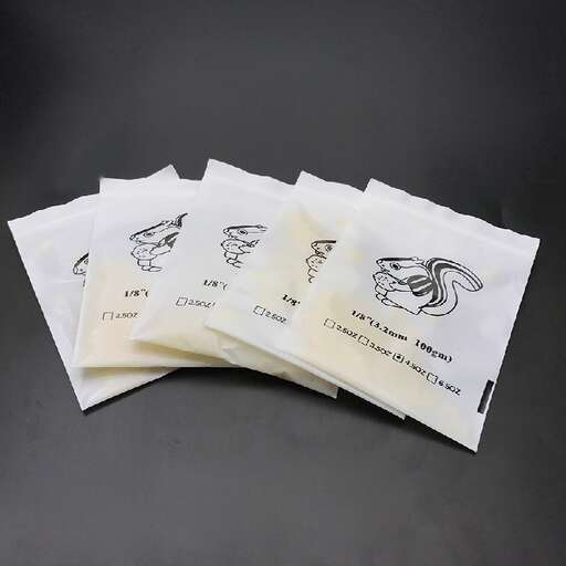 a set of three packets with a design on them.