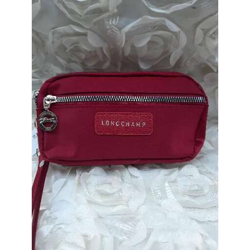 a small pouch with a pretty floral pattern.