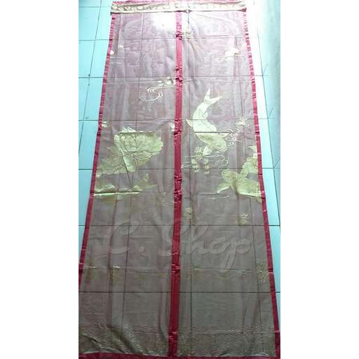 a large, colorful, mesh curtain with a bird on it.