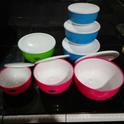 a table that has some bowls on it