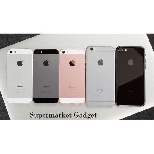 a white table holding a bunch of iphones.