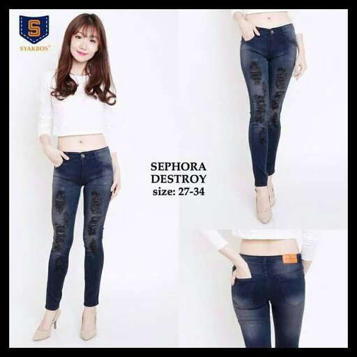 a girl in a white shirt and jeans