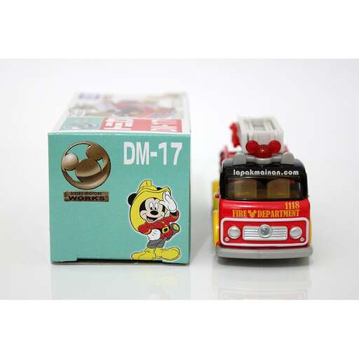 a small toy car in a box