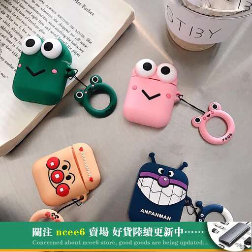 a keychain with a cute face and a keychain.