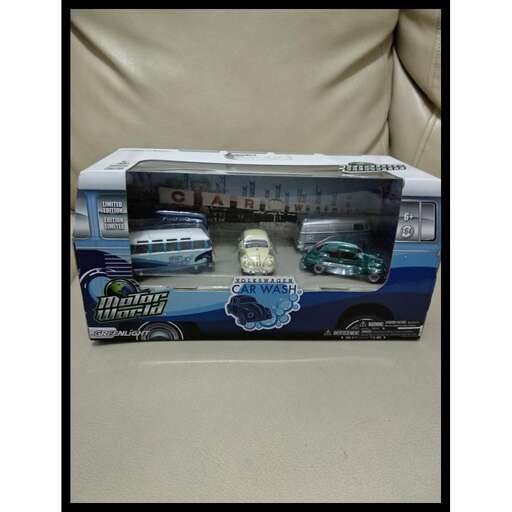 a car in a box on a chair