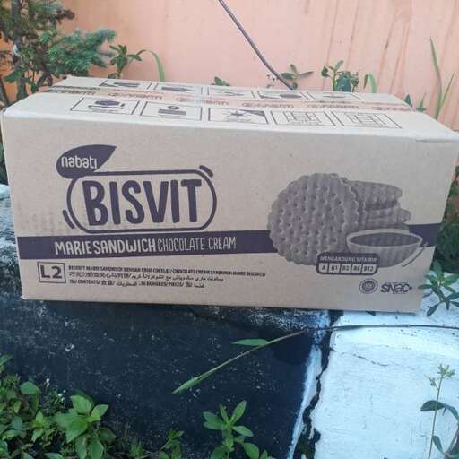 a box sitting on top of a cement block.