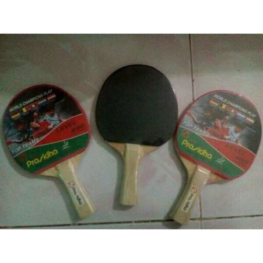 two tennis rackets with a picture of a tennis player.