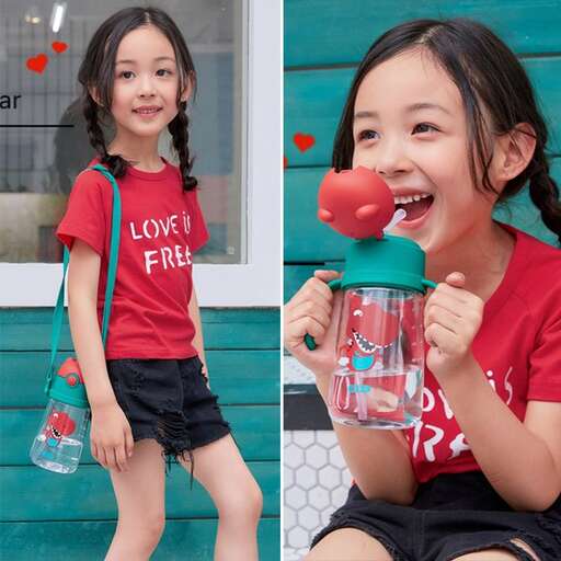 person, a girl who has a drink in her hand