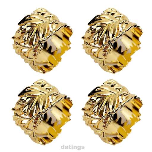 set of gold jewelry in the shape of a heart.