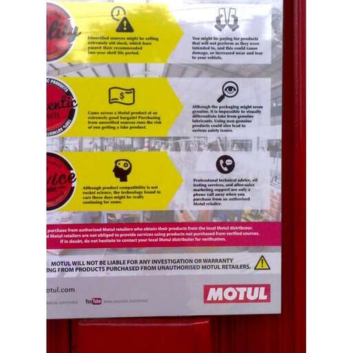 a sign on the door of the car park in the city of london.