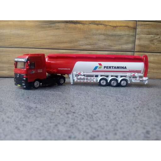 a red and white truck with a red cab.