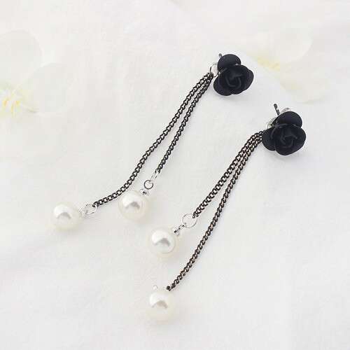 black and white glass beads and pearls in sterling silver.