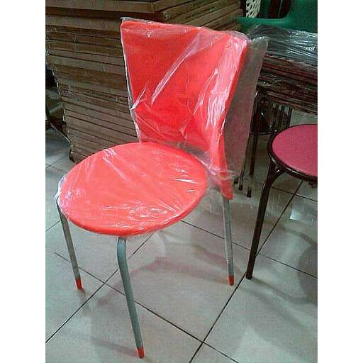 a chair with a plastic cover on it