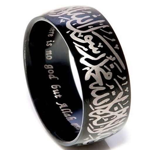 a ring with a quote written on it.