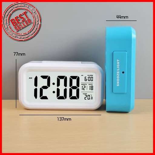 a clock that is on a table with a time on it.