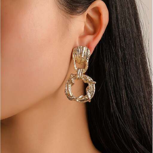 earrings with a gold leaf