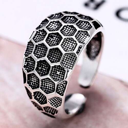 this ring is made of black and white dots.