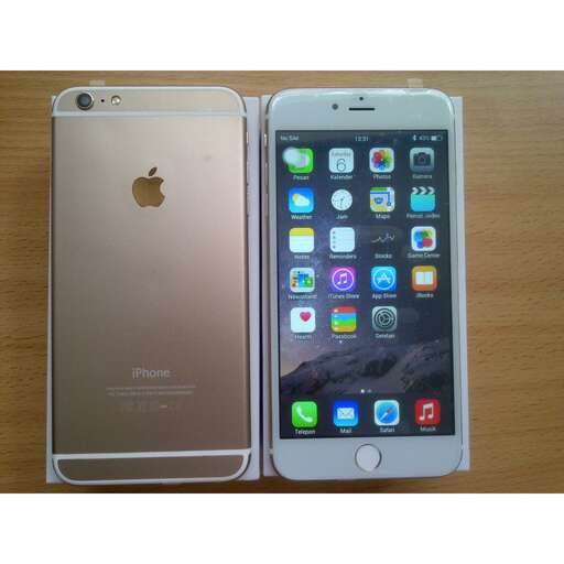 a new iphone and a new one are sitting on a table.