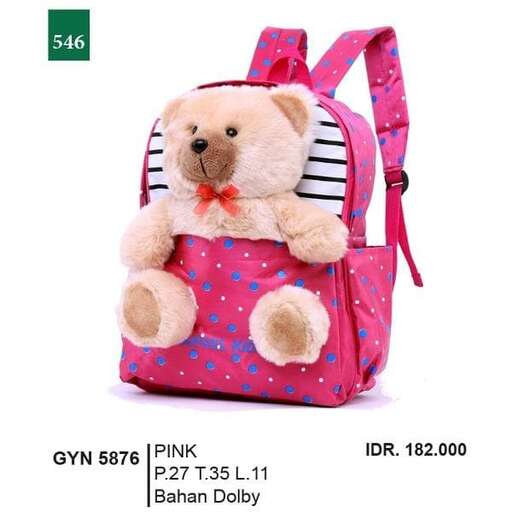 a pink teddy bear with a pink backpack.