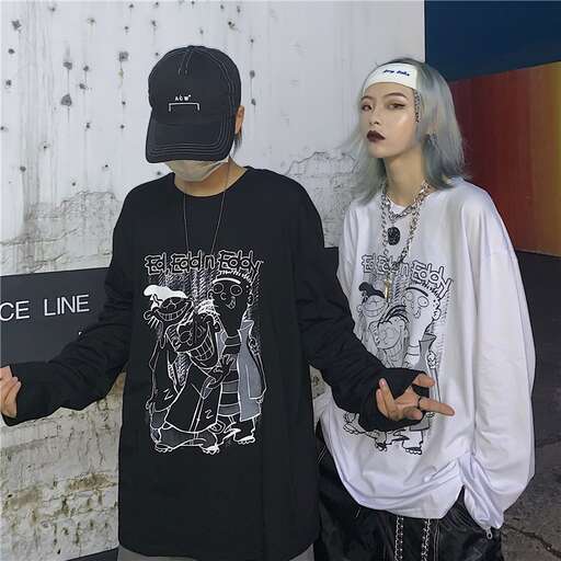 a man and a woman standing next to each other.