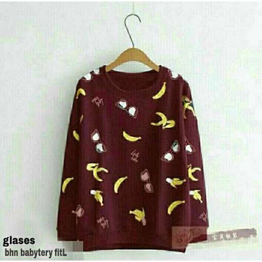 a very cute sweater with bananas on it.