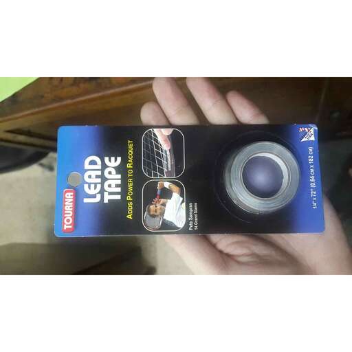 a person holding a camera in their hand.