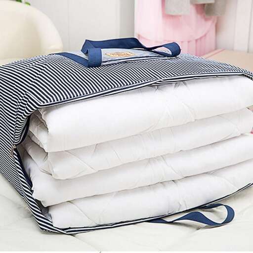 a large bag of white linens
