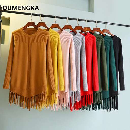 a rack of colorful sweaters