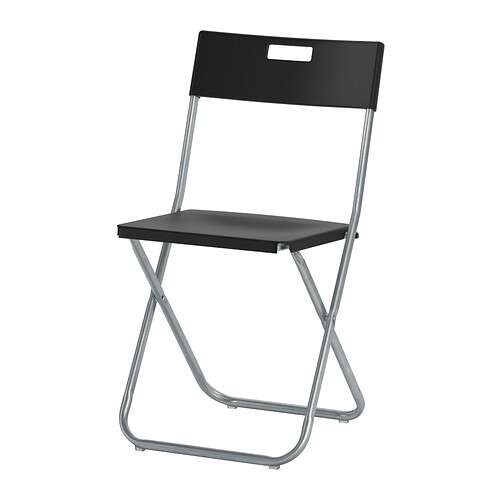the folding chair is available in black and white.