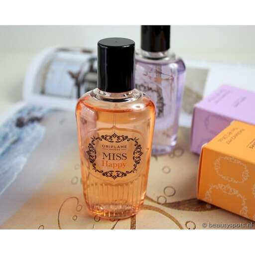 perfumes in a box on a table