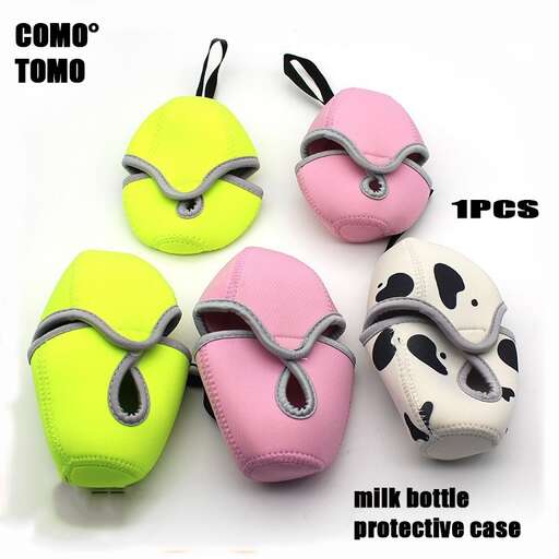 a set of three colorful plastic containers with a cow in the background.