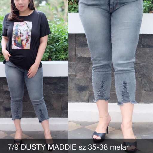 person, a girl who is wearing jeans.